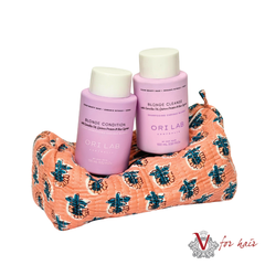 Peach Petal Ori Lab Blonde Travel Set on bag