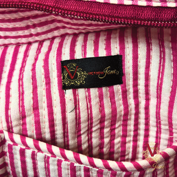 Tibetan Tiger Pink Zipped Designer Carry All Tote Bag close up logo