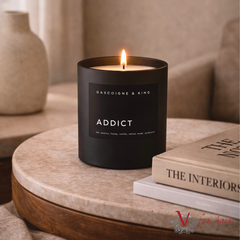 Addict Candle - 400ml candle on side table with books