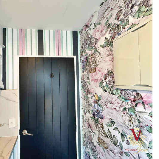 bird cage and Striped Blush Wallpaper in laundry room