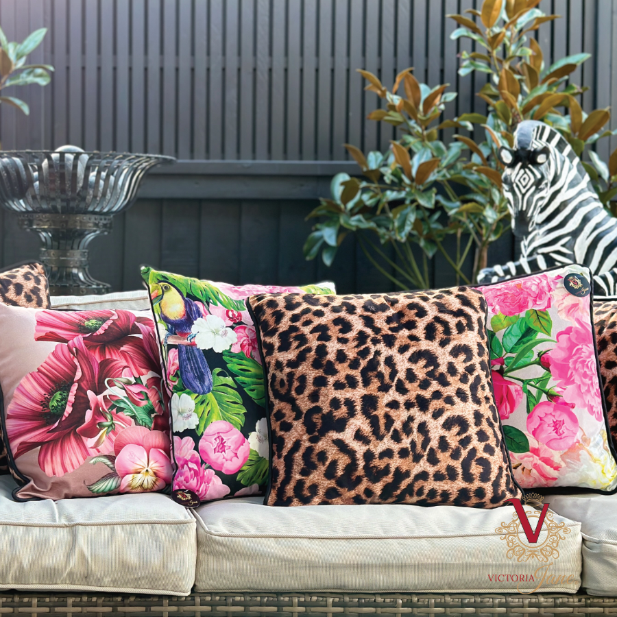 Peony Power Velvet Cushion on couch styled with victoria jane cushions