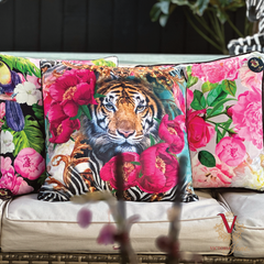 Peony Power Velvet Cushion styled on couch with victoria jane cushions