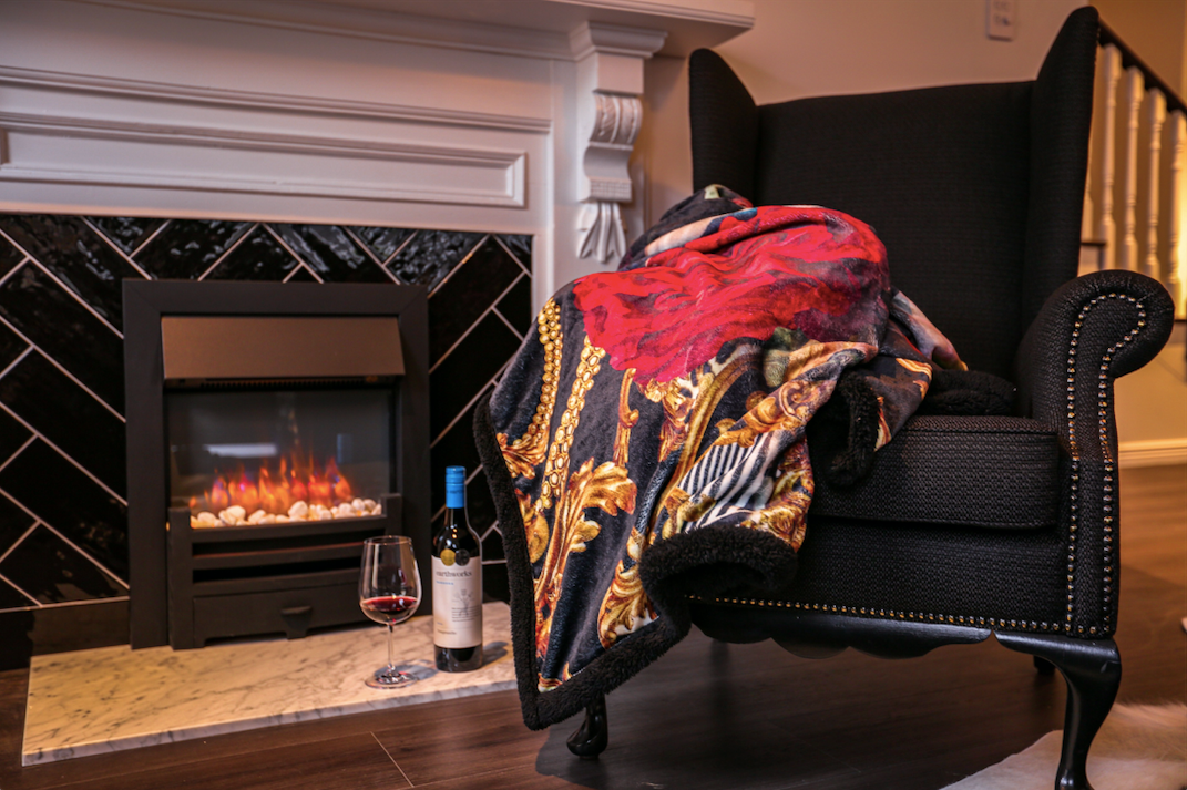 Victoria Jane - Lily Bird high quality sherpa blanket colourful vibrant Forest Fantasy Collection lifestyle living room warm fire lounge