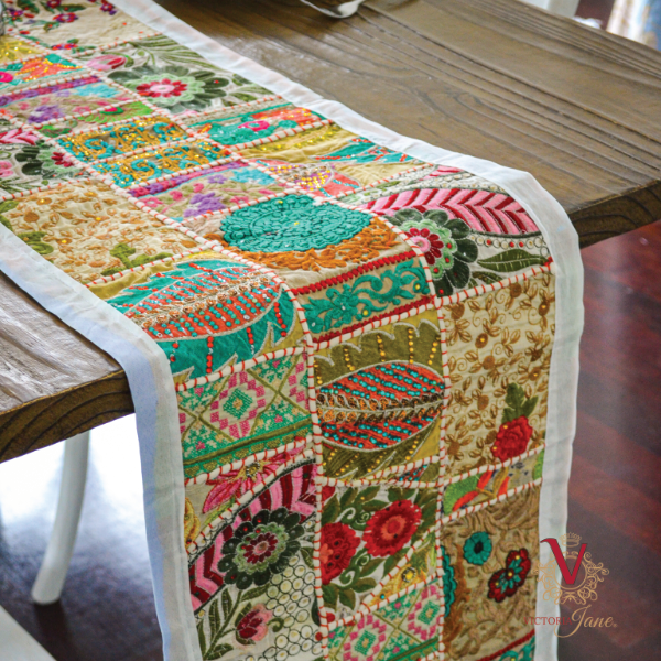 Colourful Cascade Table Runner draped over table