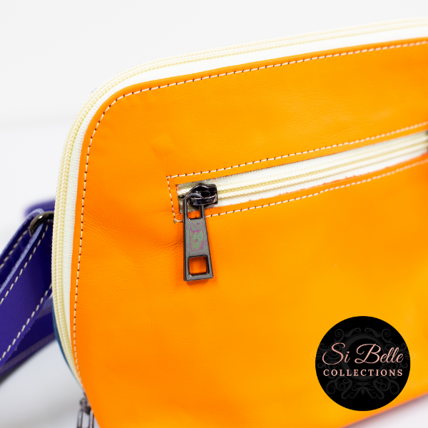 Si Belle Collections Blue, Orange and Purple Leather Bag close up