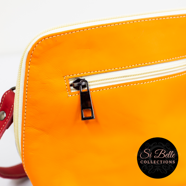 Si Belle collections Orange, Purple and Red Leather Bag close up