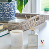 Tilley - Tahitian Frangipani Candle & Reed Diffuser on coffee table