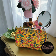 Golden Floral Pouch Bag Set dressing table