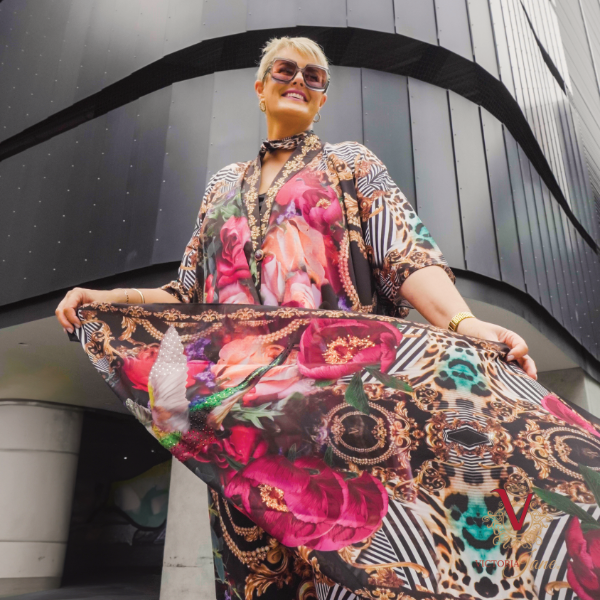 Silk Crepe Peony Bird Kimono billowing in wind with happy model victoria jane