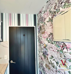 bird cage and Striped Blush Wallpaper in laundry room 