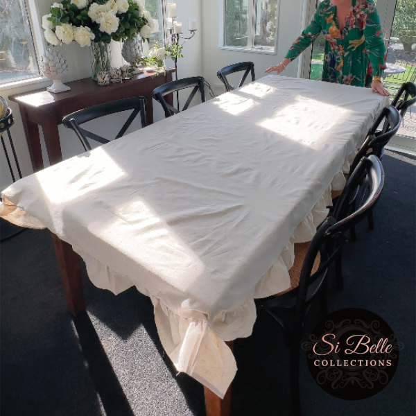 si belle collections Linen Ruffle Tablecloth laying on table