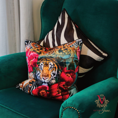 Peony Tiger Velvet Cushion on green chair with victoria jane zebra