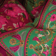Cerise Celebration Cushion close up with green with envy cushion