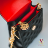 stylish victoria jane cross body phone black noir and raspberry red quilted gold chain top view