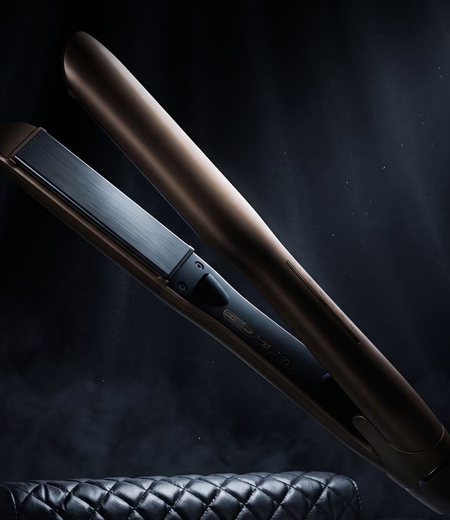 Professional hair straightening iron with titanium plates