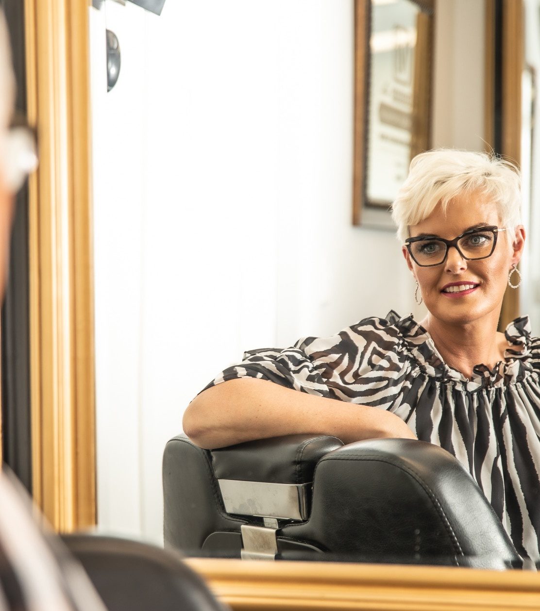 Vicki Ogden-O’Fee at the salon mirror, V For Hair Christchurch